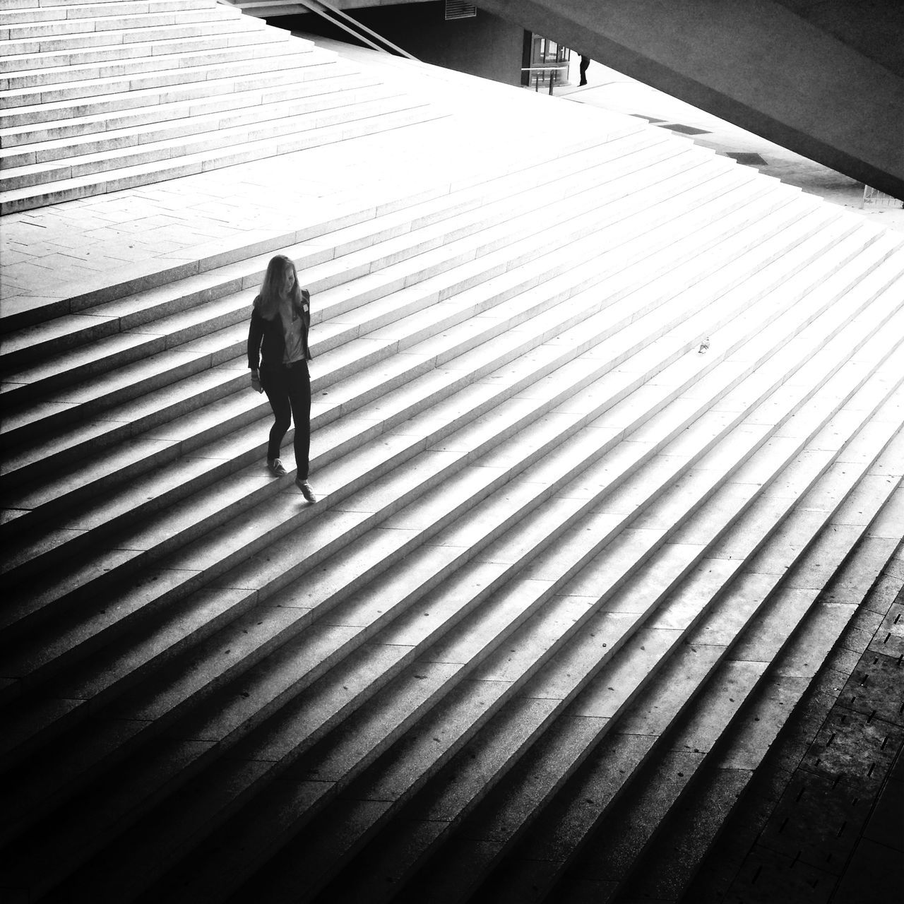 full length, walking, lifestyles, men, rear view, built structure, silhouette, architecture, shadow, leisure activity, standing, building exterior, day, person, city life, sunlight, steps, city