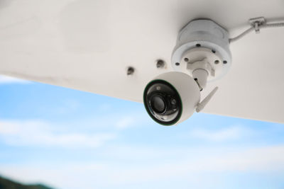 Low angle view of security camera