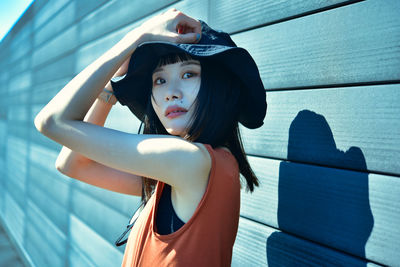 Portrait of young woman looking away