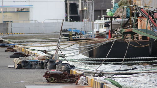 Fishing boats moored at harbor