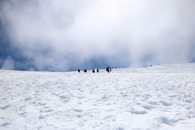 Scenic view of snow covered landscape against sky