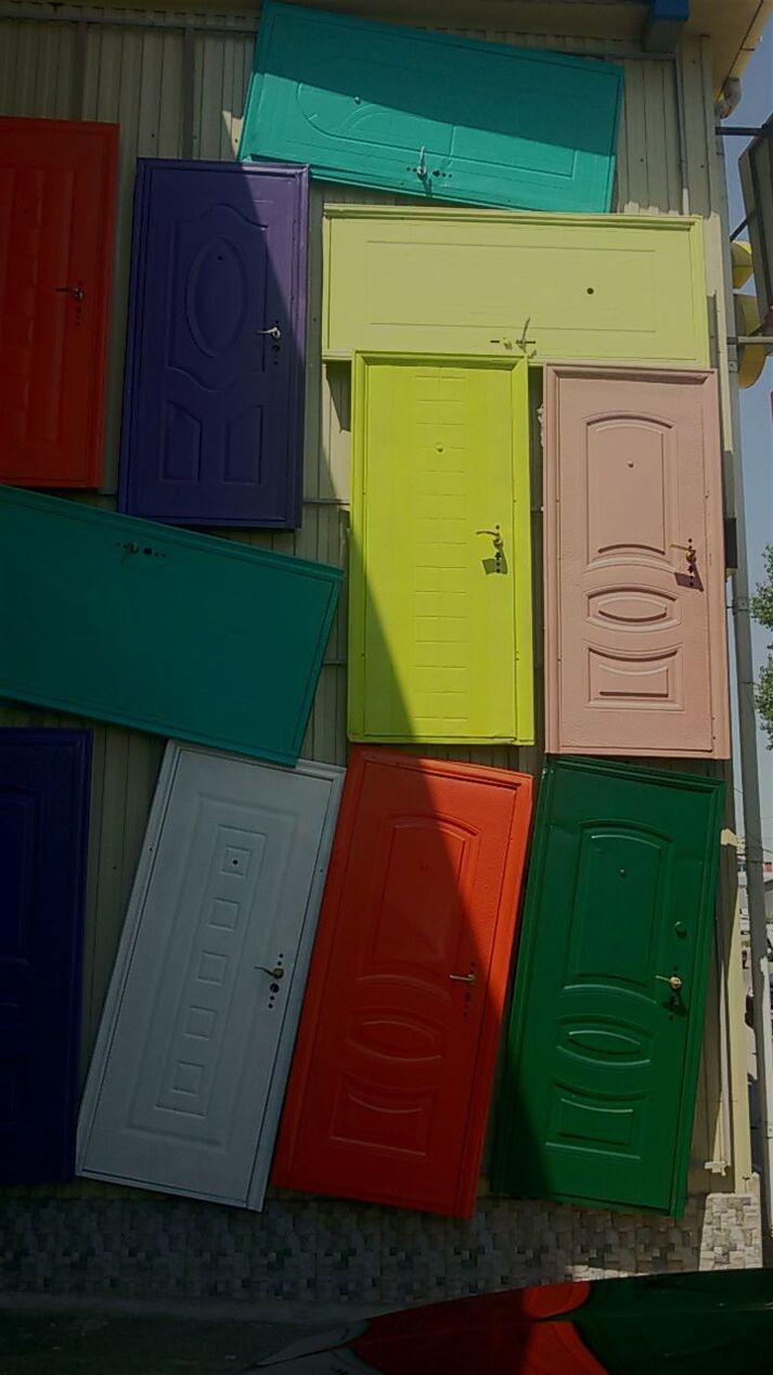 architecture, built structure, multi colored, residential building, no people, blue, day, outdoors, colorful, exterior, side by side, green color