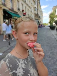 Side view of young woman drinking water