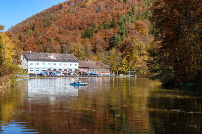 Scenic view of lake by trees during autumn