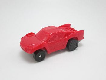 Close-up of toy car against white background