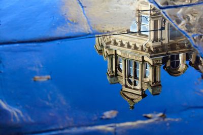 Low angle view of built structure against blue sky