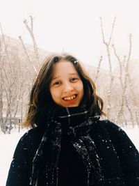 Portrait of smiling girl in winter