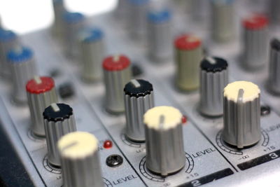 Close-up of knob on sound mixer