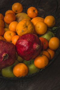 High angle view of oranges in container