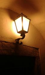 Low angle view of illuminated lamp