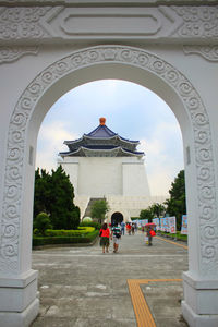 People in front of historical building