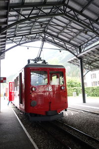 Red train at railroad station