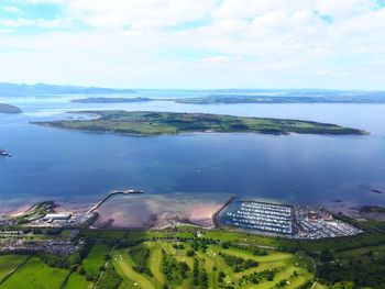 High angle view of land against sea and sky