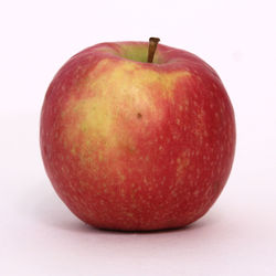 Close-up of apple against white background