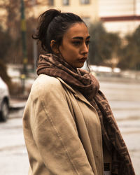 Young woman standing outdoors