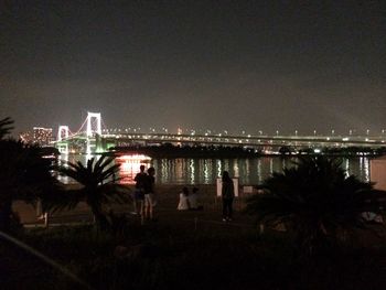 Illuminated cityscape at night