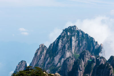 Panoramic view of mountain range against sky