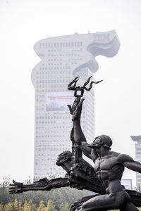 Low angle view of statue against clear sky