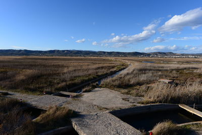 Scenic view of land against sky