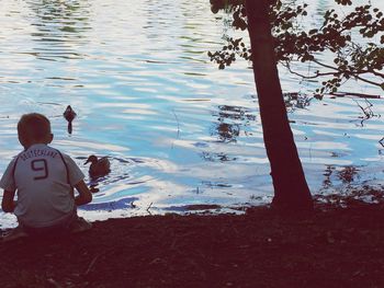 Woman standing in lake