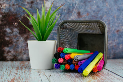 Close-up of multi colored pencils on table