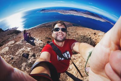 High angle view of woman standing on beach