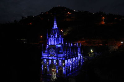 Illuminated building lit up at night