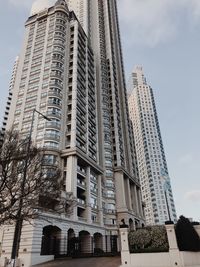 Low angle view of modern buildings against sky