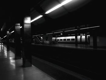 Railroad station platform at night