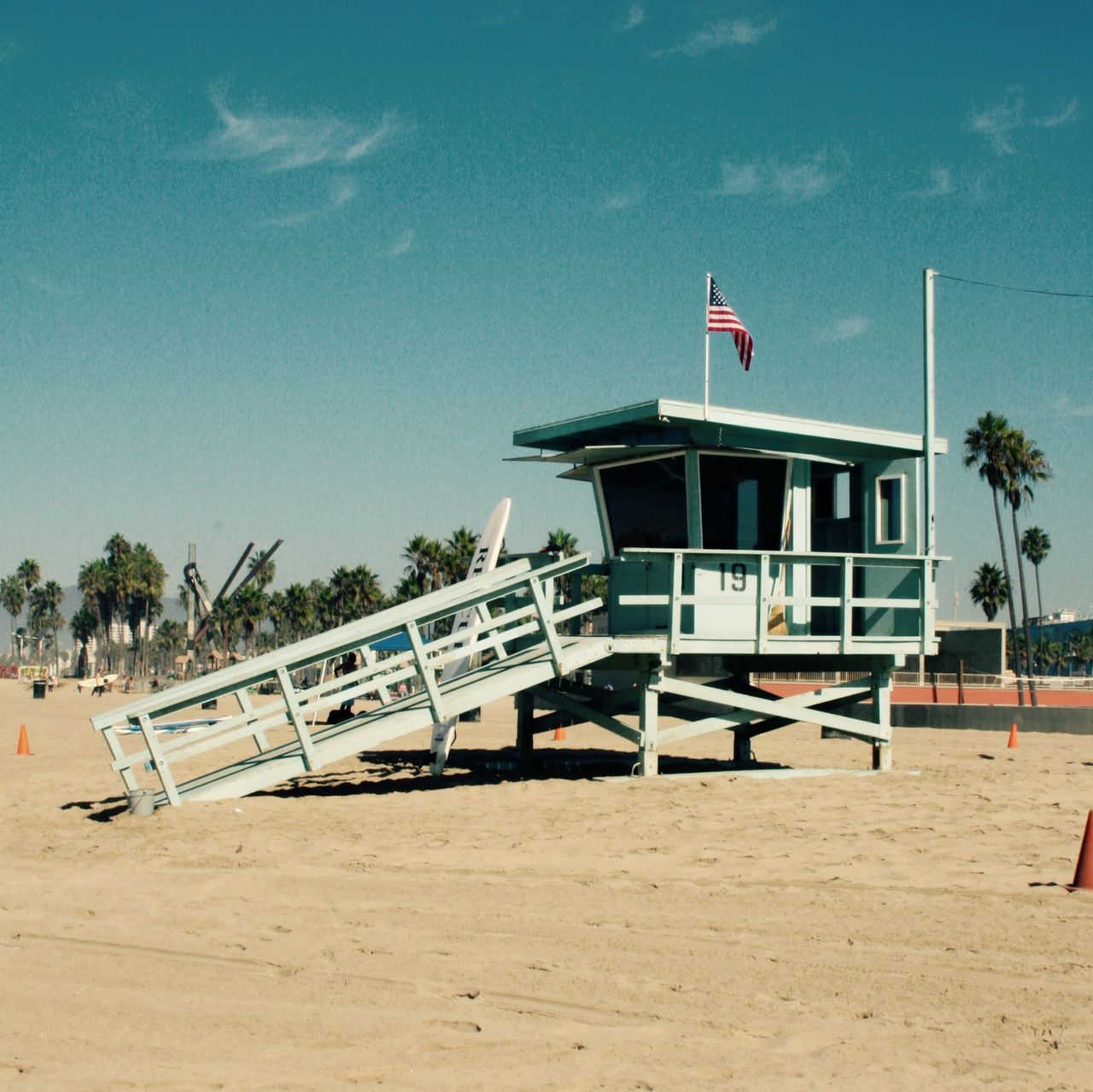 BUILT STRUCTURE ON BEACH AGAINST SKY