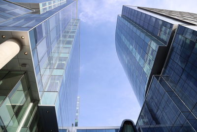 Low angle view of modern buildings against sky