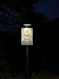 Information sign at night