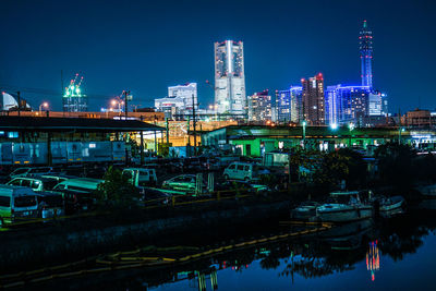 Illuminated buildings in city at night