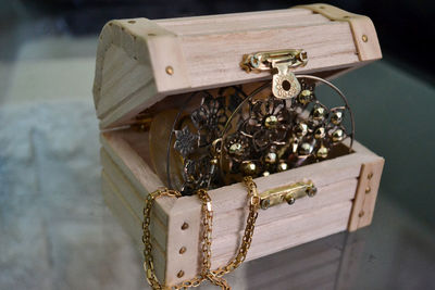 Close-up of jewelry in wooden box