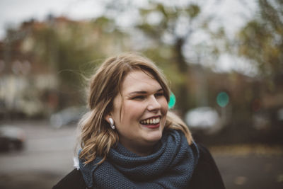 Happy woman looking away