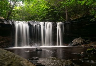 View of waterfall in forest