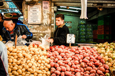 Various fruits for sale at market stall