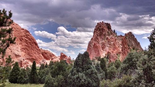 Panoramic view of trees and mountains against sky