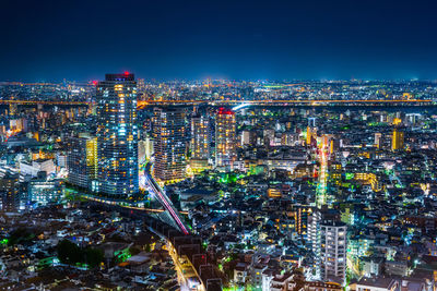 Illuminated cityscape at night