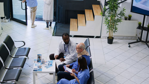 High angle view of business colleagues working in office