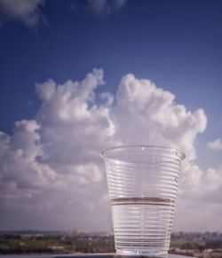 Close-up of drink against sky