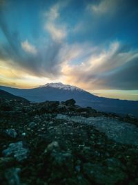 Scenic view of landscape against sky during sunset