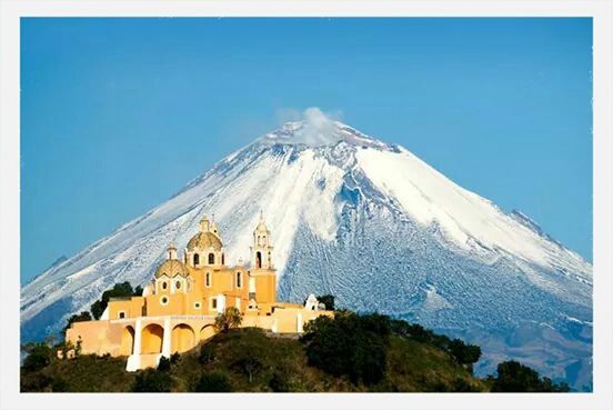 snow, winter, cold temperature, blue, clear sky, mountain, building exterior, religion, season, architecture, built structure, place of worship, spirituality, copy space, weather, white color, church, famous place, travel destinations