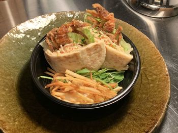 Close-up of food in plate on table