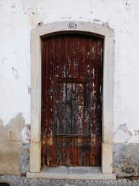 Close-up of open door of house