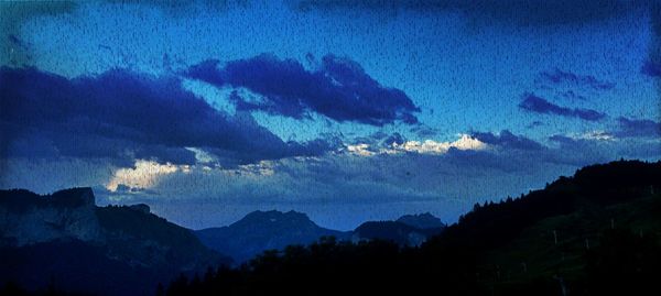 Scenic view of mountains against sky