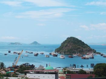 High angle view of boats moored in harbor