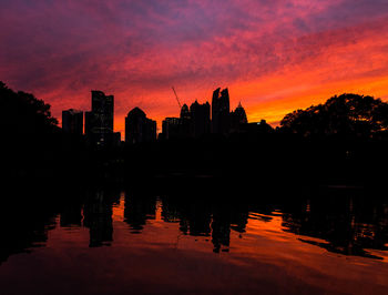 Silhouette of city at sunset