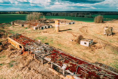 High angle view of houses and trees against sky