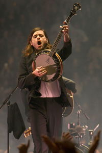 Full length of man playing guitar